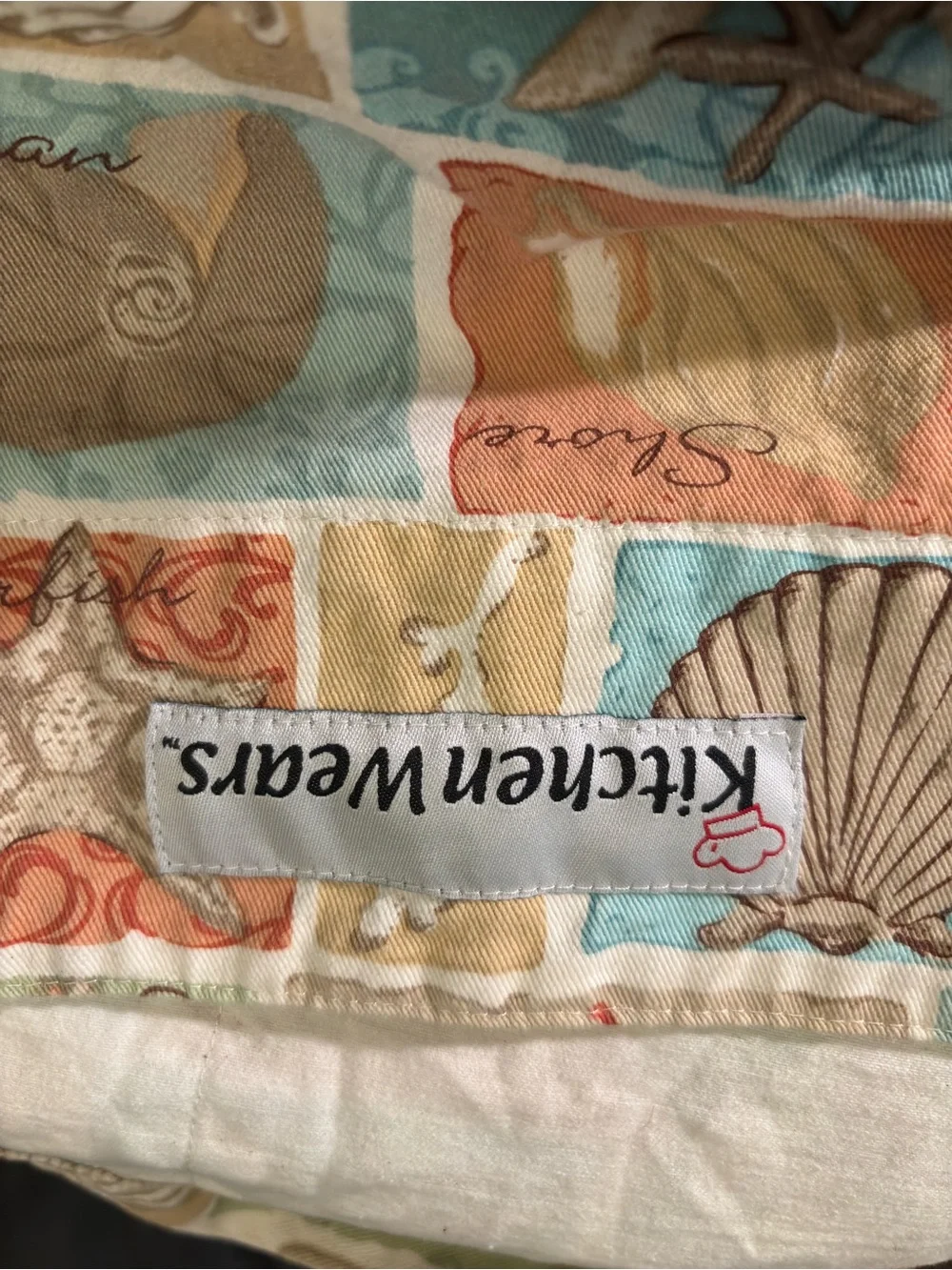 Kitchen wears apron coastal